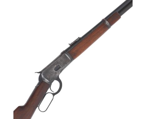 A .44-40 'Model 1892' lever-action saddle-ring carbine by Winchester, no. 893171Plain blued receiver, ring and staple, the to