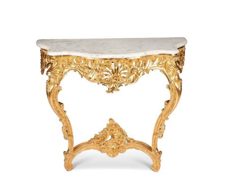 A 19th century Louis XV style giltwood serpentine console table The white veined moulded marble top above a pierced frieze, o