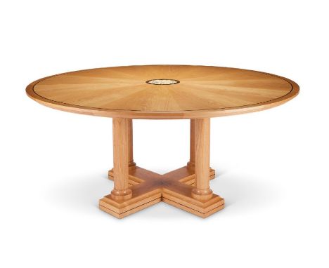 A large bespoke circular light oak and sycamore marquetry dining / games table by Linley
The centre inlaid with playing cards
