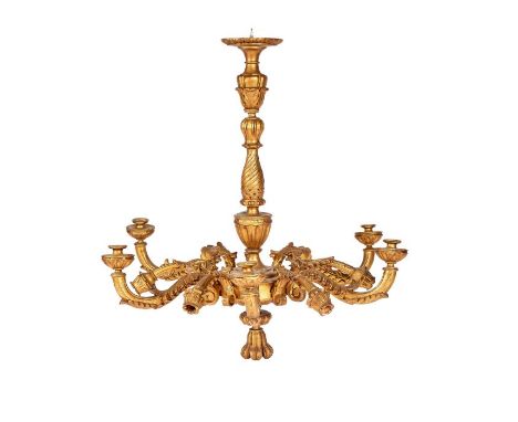 A late 19th century Italian carved giltwood five-light chandelier&nbsp;
With scrolling arms, 105cm diameter, 105cm drop.