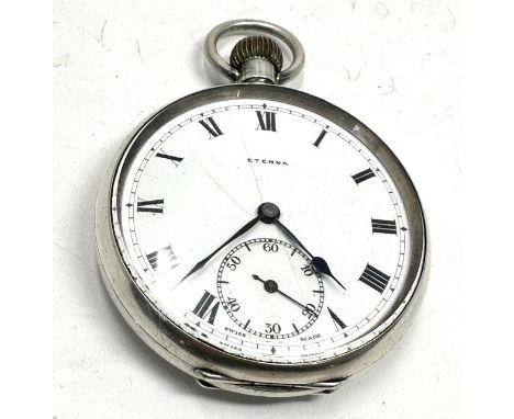 Antique silver eterna open face pocket watch the watch winds and ticks 