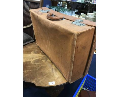 VINTAGE LEATHER SUITCASE AND A CIRCULAR OCCASIONAL TABLE