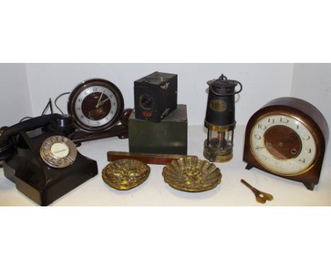 An early 20th century telephone marked central paper marked Chelmsford 71939; miners lamp; metal storage box; brass bound Mar