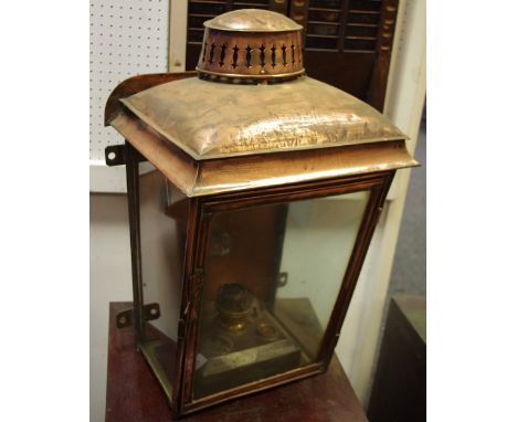 Interior Design - A substantial copper wall lantern with burner 
