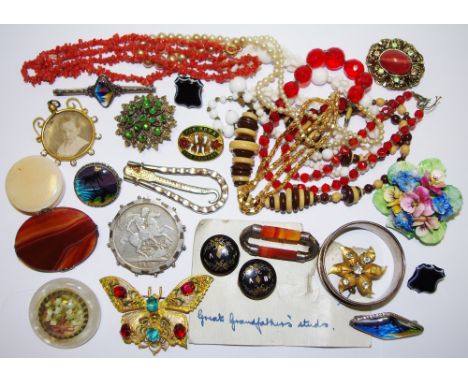 A 19th century agate brooch; another; a silver napkin ring; a pair of agate shield shape cufflinks; another pair of buttons; 