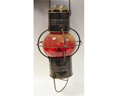 A ships red globe onion lamp