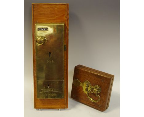 A Great Western Railway locomotive door lock plate, impressed 'G.W.R Lockerbie &amp; Wilkinson Ltd. Tipton'; an associated pa
