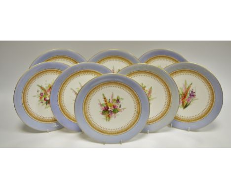 A set of eight Royal Worcester 9522 pattern dessert plates, blue border and  hand painted with wild flowers to centre 