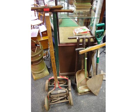 Tools - a peat shovel, grain shovel, push along lawn mowers;etc 