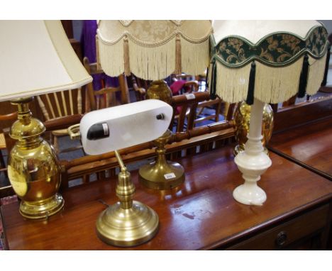 A pair of brass table lamps; another; a marble table lamp; a desk light. (5)