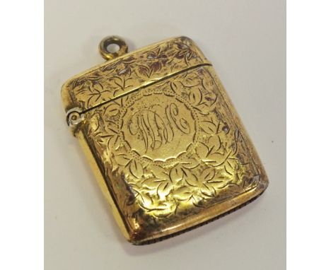 An Edwardian silver-gilt vesta case, engraved with scrolling foliage, Chester 1903