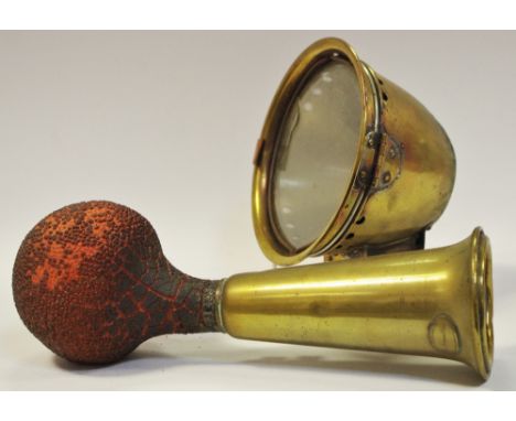 Motoring - a vintage car horn inscribed applied plaque Thos.P.Headland Ltd ' The Omnibus '; a brass car lamp (2)
