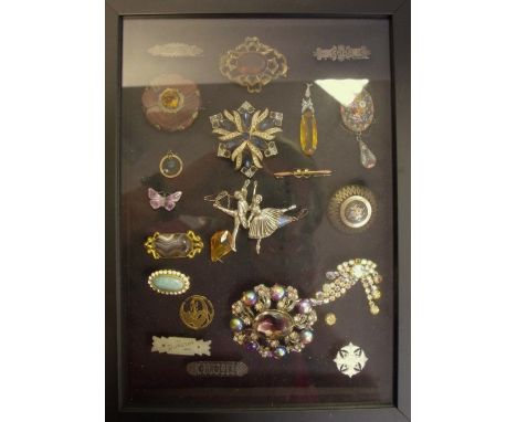 Two wall hanging display boxes containing various brooches including a Victorian 9ct gold bar brooch; other yellow metal exam