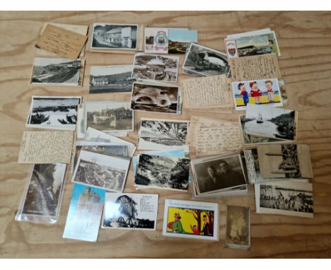 A collection of vintage postcards including travel, humorous etc.  