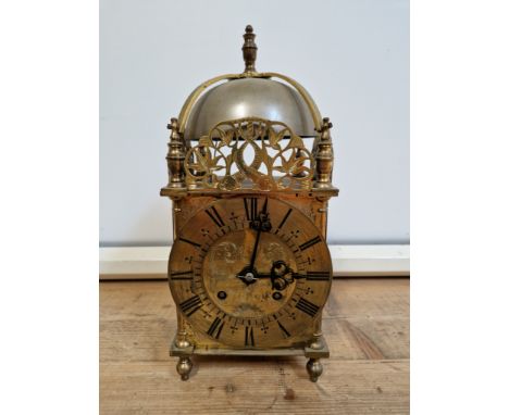 A 19th century brass lantern clock, height 37cm, marked JJE England 1457, with pendulum, no key