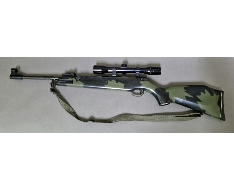 A Webley Tracker camoflage edition .22 calibre air rifle with a 4 x 32 telescopic sight, serial no.23867, 93cm long. (BUYER M