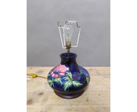 A Moorcroft pottery lamp base, height including shade 45cm.  