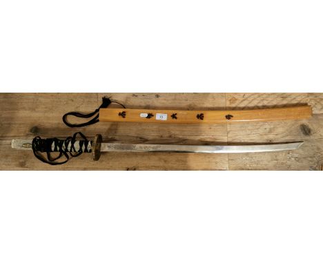 A reproduction katana sword in wooden scabbard.  