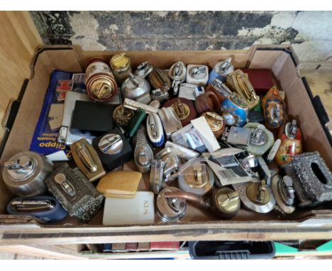 A quantity of vintage lighters.  