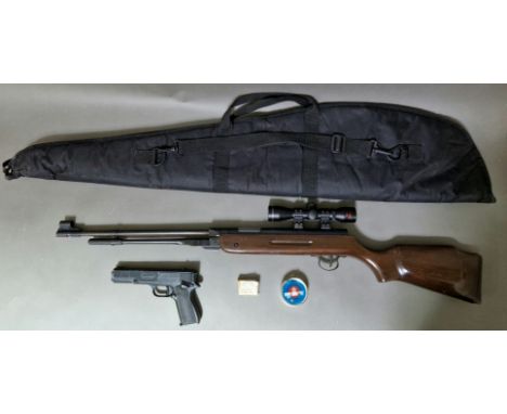 A .177 calibre air rifle with a SMK 4 x 32 telescopic sight, 140cm long, with soft bag &amp; tin of pellets together with a M