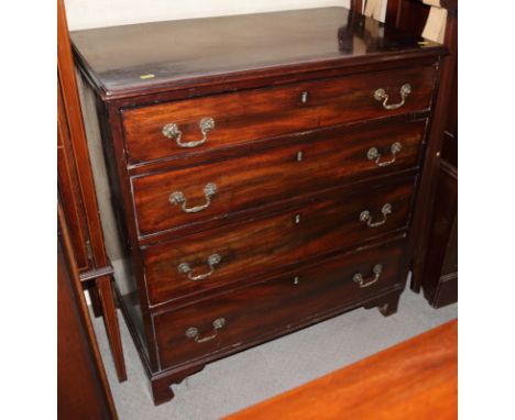 A Georgian mahogany chest of four long graduated drawers with gilt brass handles, on bracket feet, 30" wide