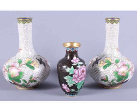 A pair of early 20th century Japanese cloisonne bottle vases, decorated birds and blossom on a white scale ground, 7" high, t