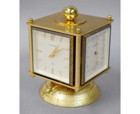 A Gilt Metal Revolving Desk Compendium Retailed by Bucherer Swiss, circa 1970, comprising timepiece, thermometer, aneroid bar