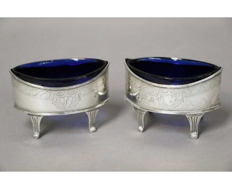 A Pair of George III Silver Salt-Cellars, by Peter and Ann Bateman, London, 1792, navette shaped and on fluted panel fleet, t