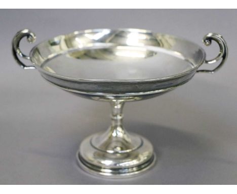 A George V Silver Pedestal-Bowl, by Walker and Hall, Sheffield, 1922, the bowl circular and with two scroll handles, on sprea