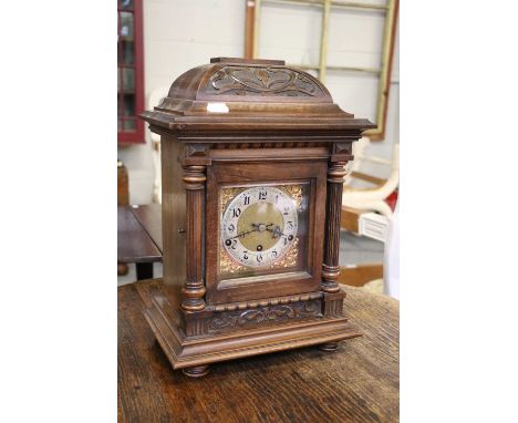 A German Chiming Table Clock, circa 1900, retailed by Gowland, Sunderland, triple spring barrel movement chiming on gong rods