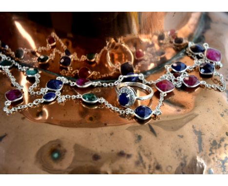 A chain necklace, combined of ruby, emerald and sapphire beads, stamped 925, 76 cm long, together with a sapphire ring (2)