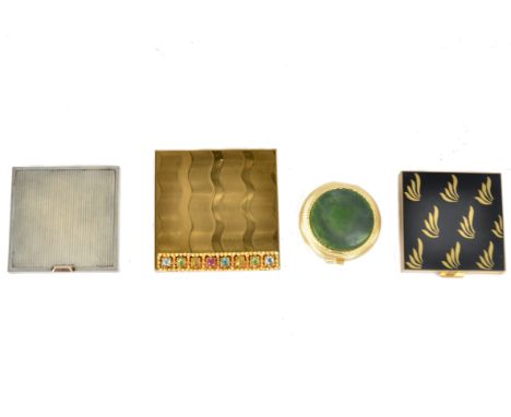 Three vintage Volupte USA compacts of rectangular design, including a swing lock example set with synthetic gems, 7.5 cm diam