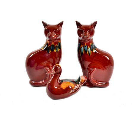 A pair of Poole Pottery Delphis models of cats, red with orange and blue collars, 29.5 cm high, together with a Poole Pottery