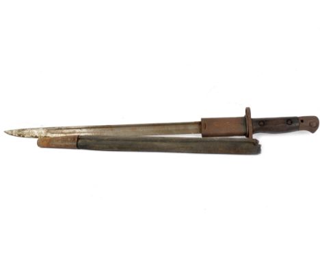 A bayonet and scabbard, single edged and blade with a medial ridge running the full length of the blade, unmarked, 63 cm leng