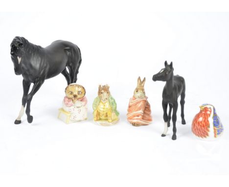 A miscellaneous collection of British Ceramic animal models including a Royal Doulton 'Black Beauty' model of a horse, 18.5 c