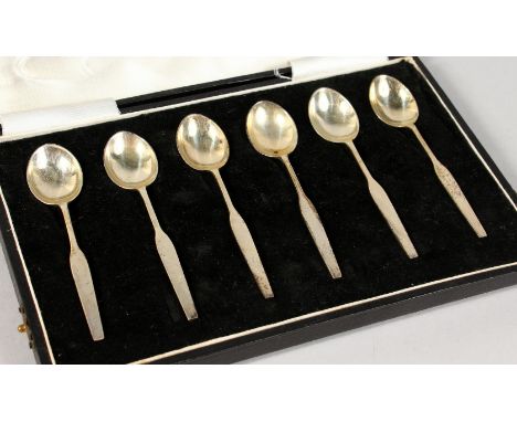 A SET OF SIX STERLING SILVER COFFEE SPOONS, cased.