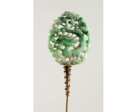 A PIERCED JADE HAIRPIN.