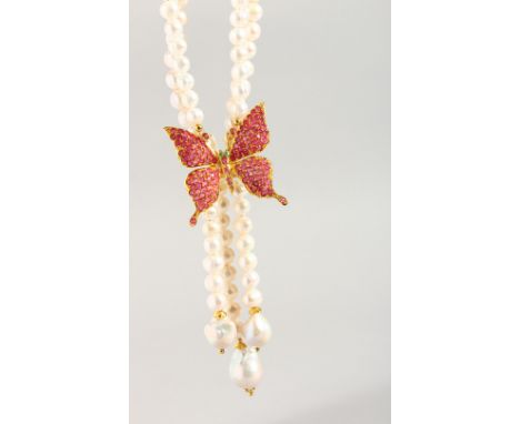 A PEARL RUBY SET BUTTERFLY NECKLACE.