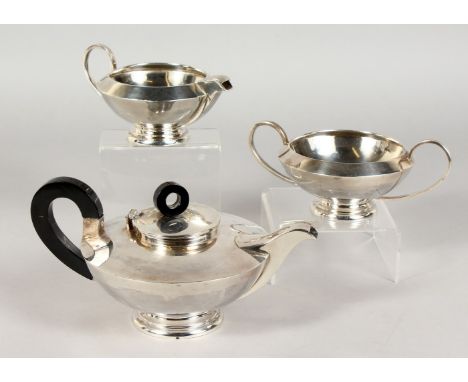 A GOOD ART DECO SILVER CIRCULAR THREE PIECE TEA SET. Sterling.  24ozs.