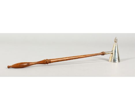 A SILVER CANDLE SNUFFER, with turned wood handle. London 1995.  12ins long.
