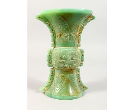 A CARVED GREEN JADE CHINESE ARABIC VASE.