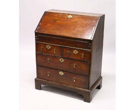 A GOOD SMALL 18TH CENTURY BUREAU, with fall front, fitted interior with well, two short and two long drawers below with brass