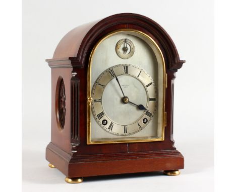 A 1920'S MAHOGANY CASED QUARTER CHIMING BRACKET CLOCK by BOND &amp; KEDGE, PUTNEY, with silvered dial, on bun feet. 9ins high