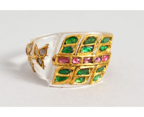 A DESIGNER RING SET WITH RUBY, DIAMOND AND EMERALD.