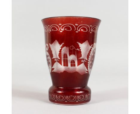 A RUBY GLASS ETCHED BEAKER. 5ins high.