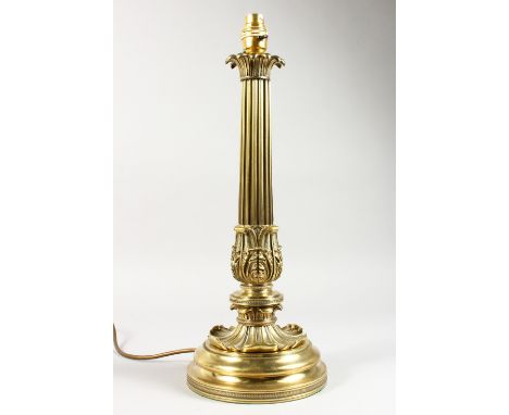 A GOOD ORNATE BRASS TABLE LAMP BASE. 17.5ins high including fitting.