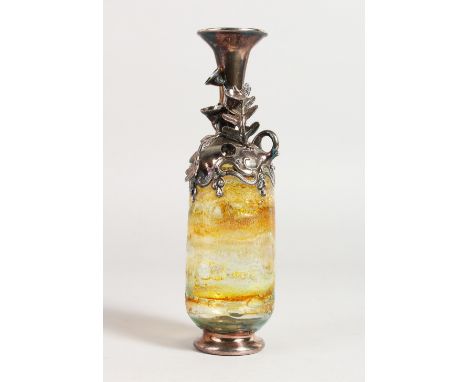 AN UNUSUAL SILVER MOUNTED ROMAN STYLE GLASS BOTTLE. 8ins high.