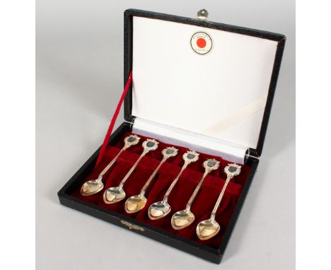 A SET OF SIX TOKYO SILVER SPOONS, cased.