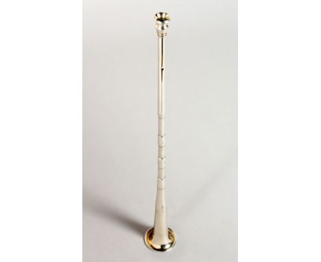 A MINIATURE SILVER HUNTING HORN. 12ins long.  Chester 1927.  Maker: EB.