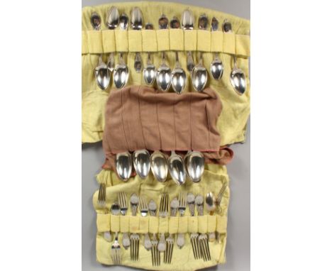 A TIFFANY &amp; CO STERLING SILVER CANTEEN, comprising six tablespoons, six dessert spoons, six teaspoons, six table forks an